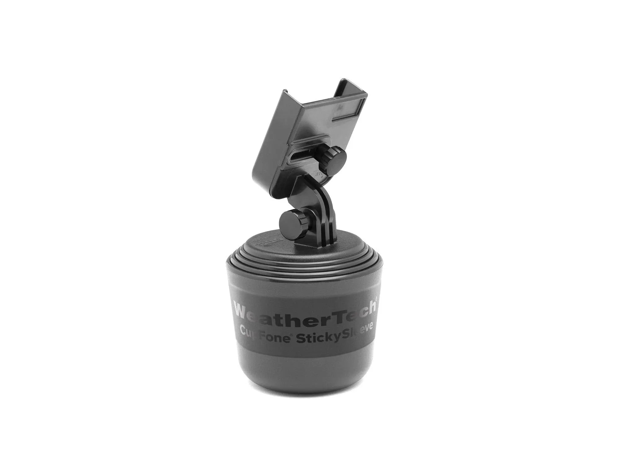 WeatherTech CupFone mounted in a car cup holder, securely holding a smartphone with open access for charging. Black plastic design.