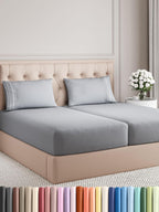 CGK Unlimited queen sheet set in white, featuring breathable, soft, and wrinkle-free fabric with deep pockets.