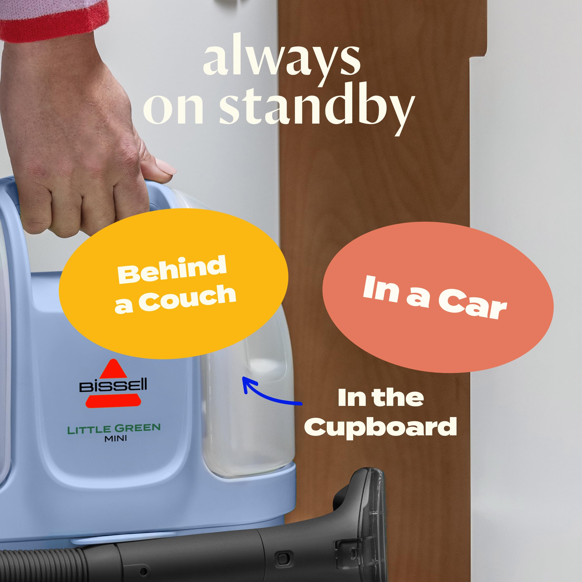 BISSELL Little Green Mini portable carpet cleaner in tea green with HydroRinse tool and 4" tough stain tool on display.