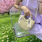 Eiyye off white woven straw beach bag, stylish shoulder tote purse perfect for summer outings.