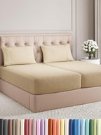 CGK Unlimited 4 Piece White Sheet Set featuring deep pockets, soft wrinkle-free fabric, perfect for queen-sized beds.