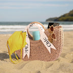 Eiyye off-white woven tote purse, perfect for summer beach outings, featuring a stylish shoulder strap and straw design.